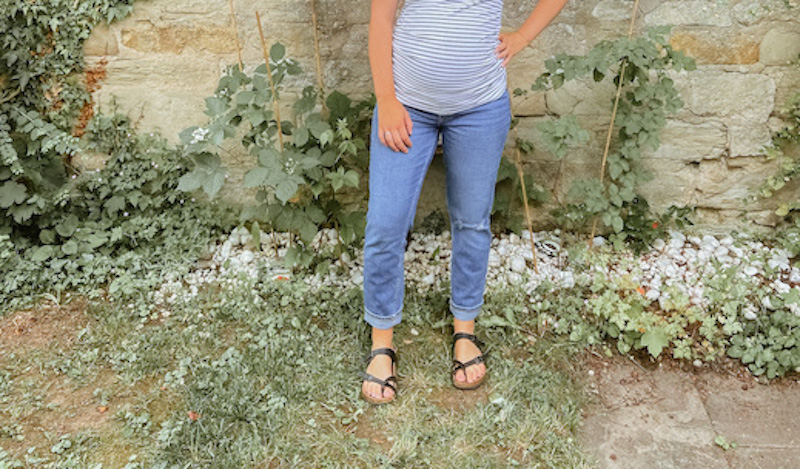 Women outside in jeans and a t-shirt